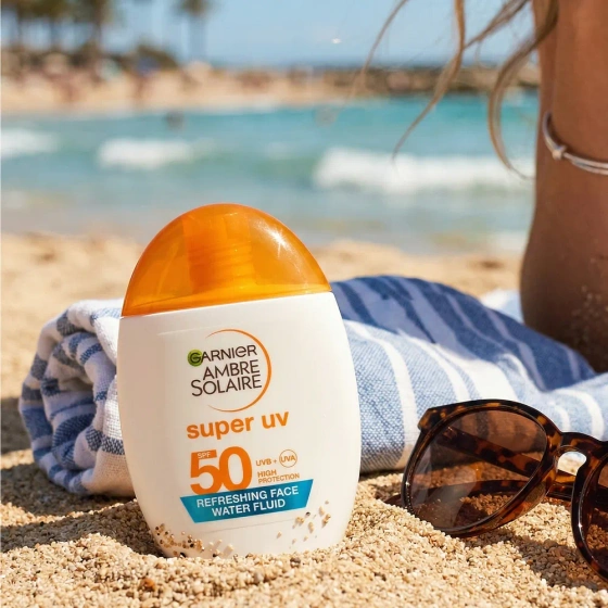 Garnier Ambre Solaire Super UV Refreshing Face Water Fluid SPF50 освежающий флюид для лица с высокой защитой 40 мл